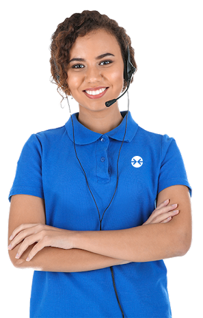 A woman wearing a blue polo shirt and a headset with her arms crossed.